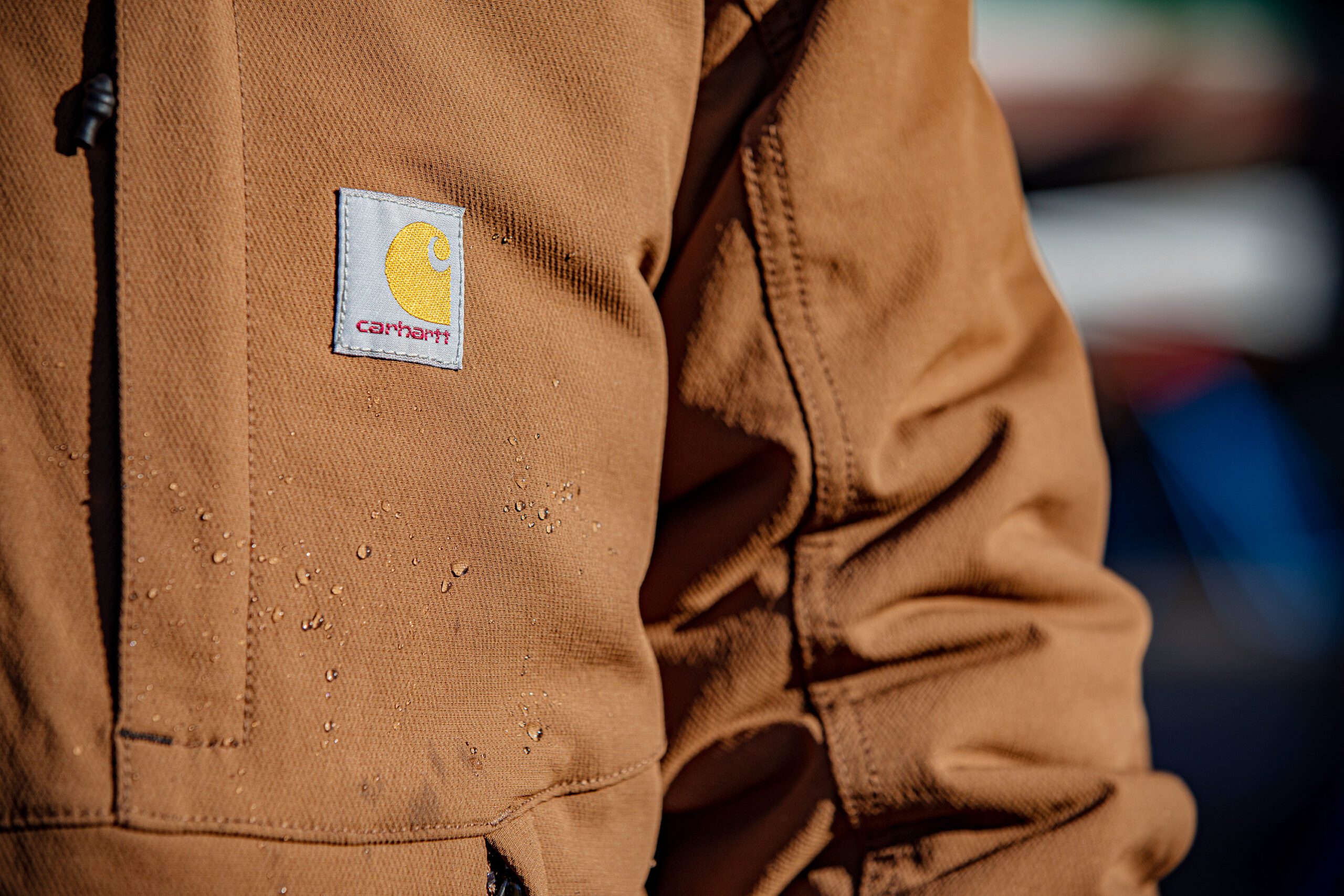 Carhartt jacket with water droplets.